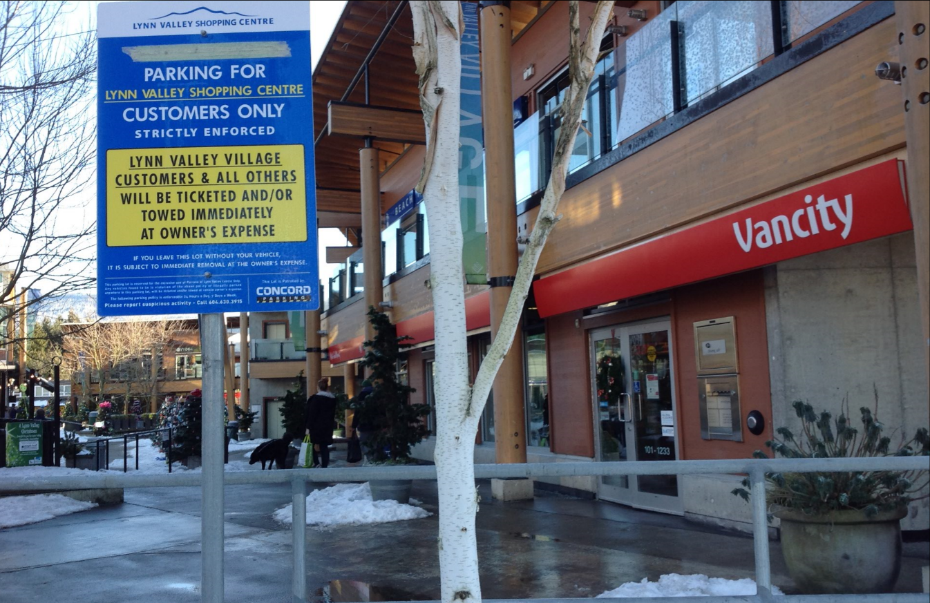 Yup, VanCity is part of the Village. You need to drive around the block and find an underground park if you want to get to your money